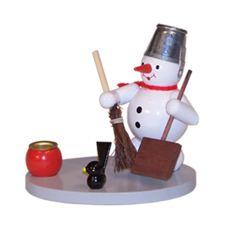 Snowman with shovel by Volker Zenker